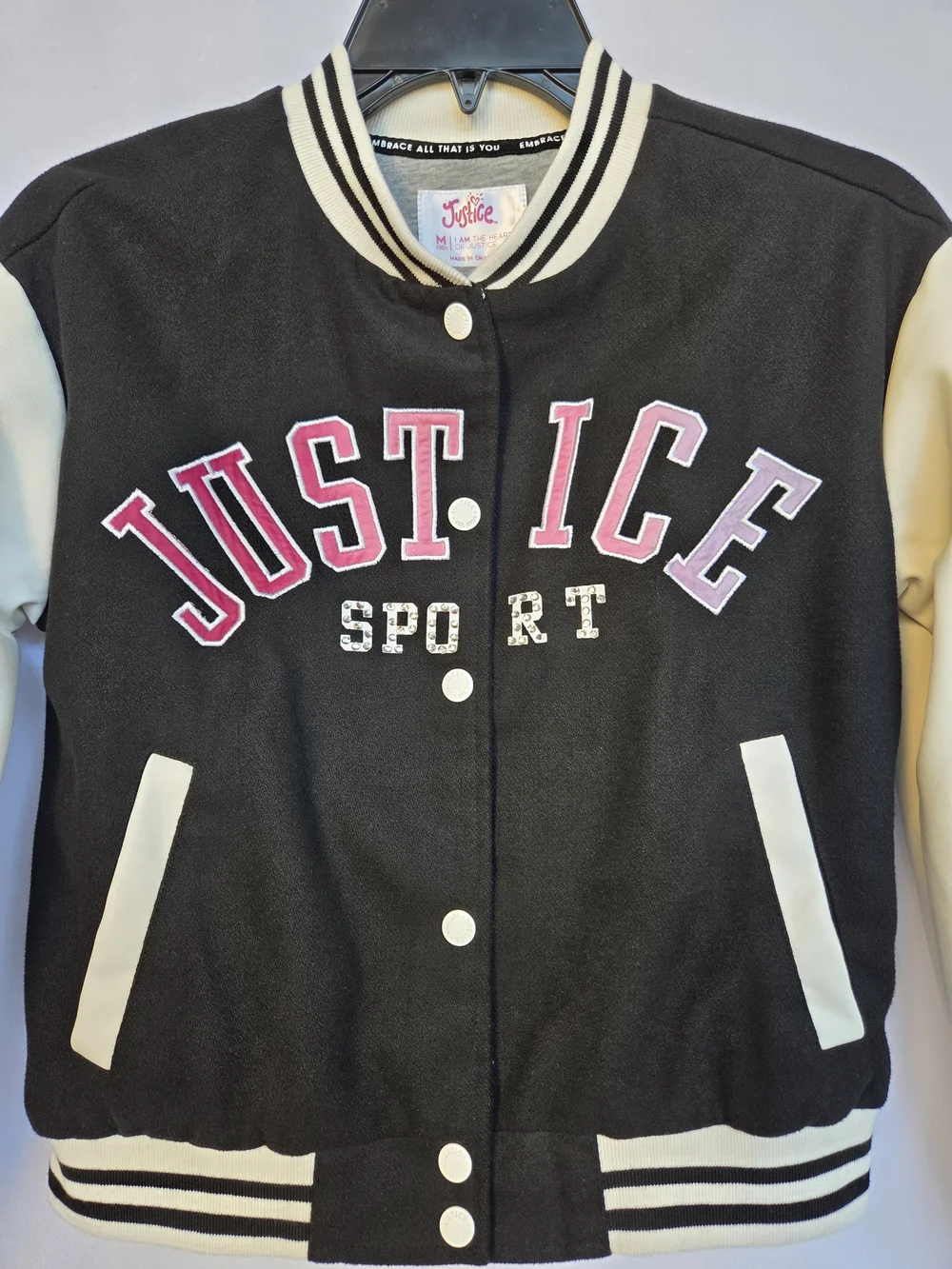 Justice black varsity
